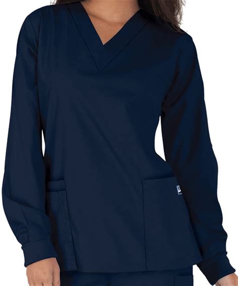 For storage, it has two roomy front pockets with a pen pocket. . Buttersoft scrubs
